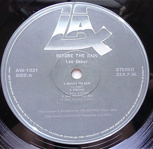 Lee Oskar - Before The Rain (Vinyl, LP, Album) Very Good Plus (VG+) / Very Good Plus (VG+)