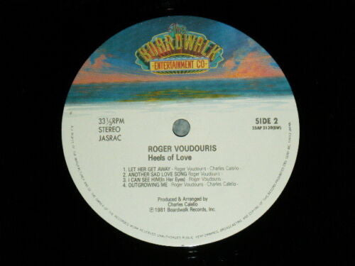 Roger Voudouris - On The Heels Of Love (Vinyl, LP, Album) Near Mint (NM or M-) / Good Plus (G+)