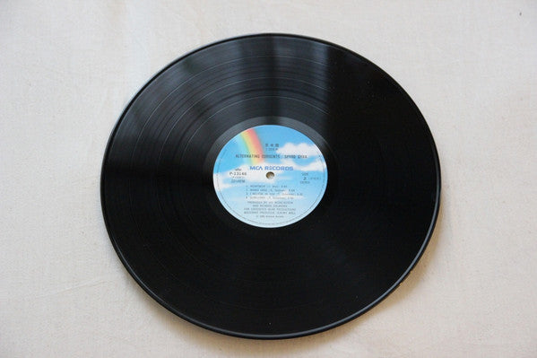 Spyro Gyra - Alternating Currents (Vinyl, LP, Album, Promo) Good Plus (G+) / Good Plus (G+)