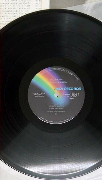 Gil Evans And His Orchestra - Into The Hot (Vinyl, LP, Reissue, Stereo) Very Good Plus (VG+) / Poor (P)