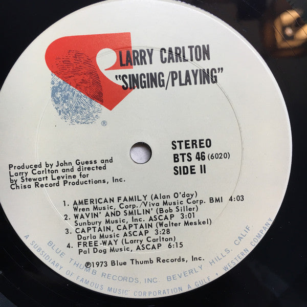 Larry Carlton - Singing / Playing (Vinyl, LP, Album) Good Plus (G+) / Good Plus (G+)