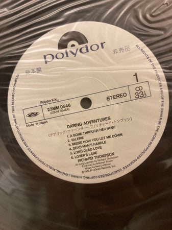 Richard Thompson - Daring Adventures (Vinyl, LP, Album, Promo) Near Mint (NM or M-) / Very Good Plus (VG+)