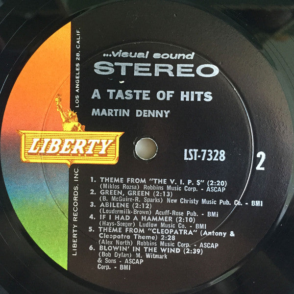 Martin Denny - A Taste Of Hits (Vinyl, LP, Album, Stereo) Very Good (VG) / Good Plus (G+)