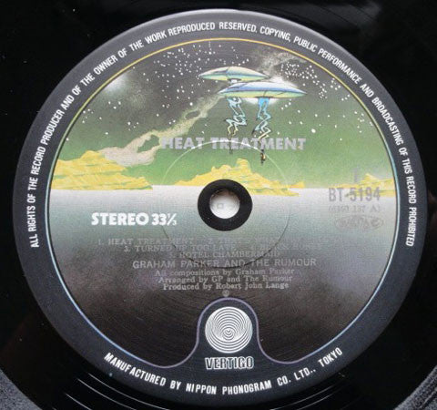 Graham Parker And The Rumour - Heat Treatment (Vinyl, LP, Album, Reissue) Very Good (VG) / Very Good (VG)