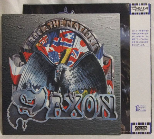 Saxon - Rock The Nations (Vinyl, LP, Album) Very Good Plus (VG+) / Very Good Plus (VG+)