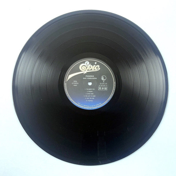 Dan Fogelberg - Phoenix (Vinyl, LP, Album, Promo) Near Mint (NM or M-) / Very Good Plus (VG+)