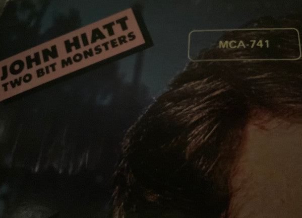 John Hiatt - Two Bit Monsters (Vinyl, LP, Album) Good Plus (G+) / Very Good Plus (VG+)