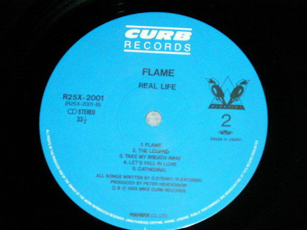 Real Life - Flame (Vinyl, LP, Album) Very Good Plus (VG+) / Very Good (VG)
