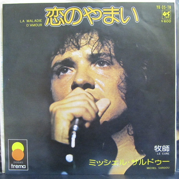 Michel Sardou - La Maladie D'amour / Le Curé (Vinyl, 7", 45 RPM, Single) Very Good Plus (VG+) / Very Good (VG)
