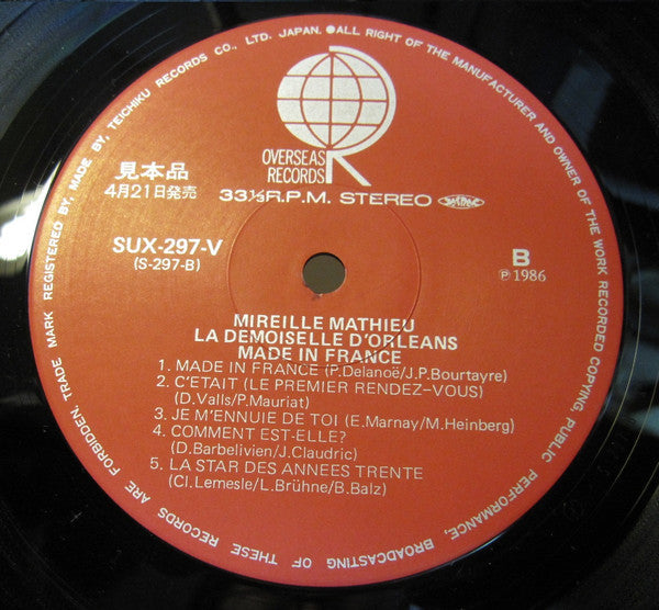 Mireille Mathieu - La Demoiselle D'Orléans - Made In France (Vinyl, LP, Album, Promo, Stereo) Near Mint (NM or M-) / Very Good (VG)