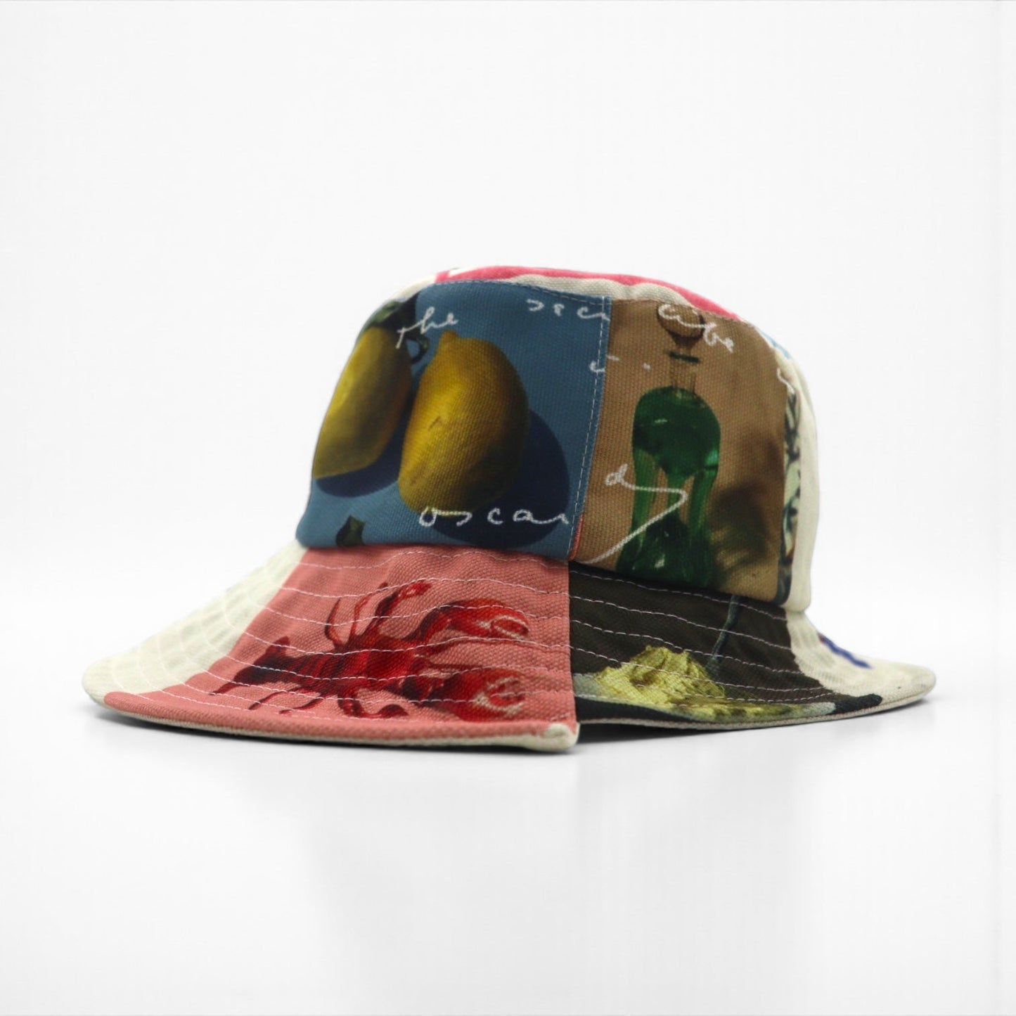 J.W.ANDERSON アシンメトリー バケットハット Asymmetric Bucket Hat マルチカラー 総柄 ロゴテープ ストラップ AC0177FA0153019