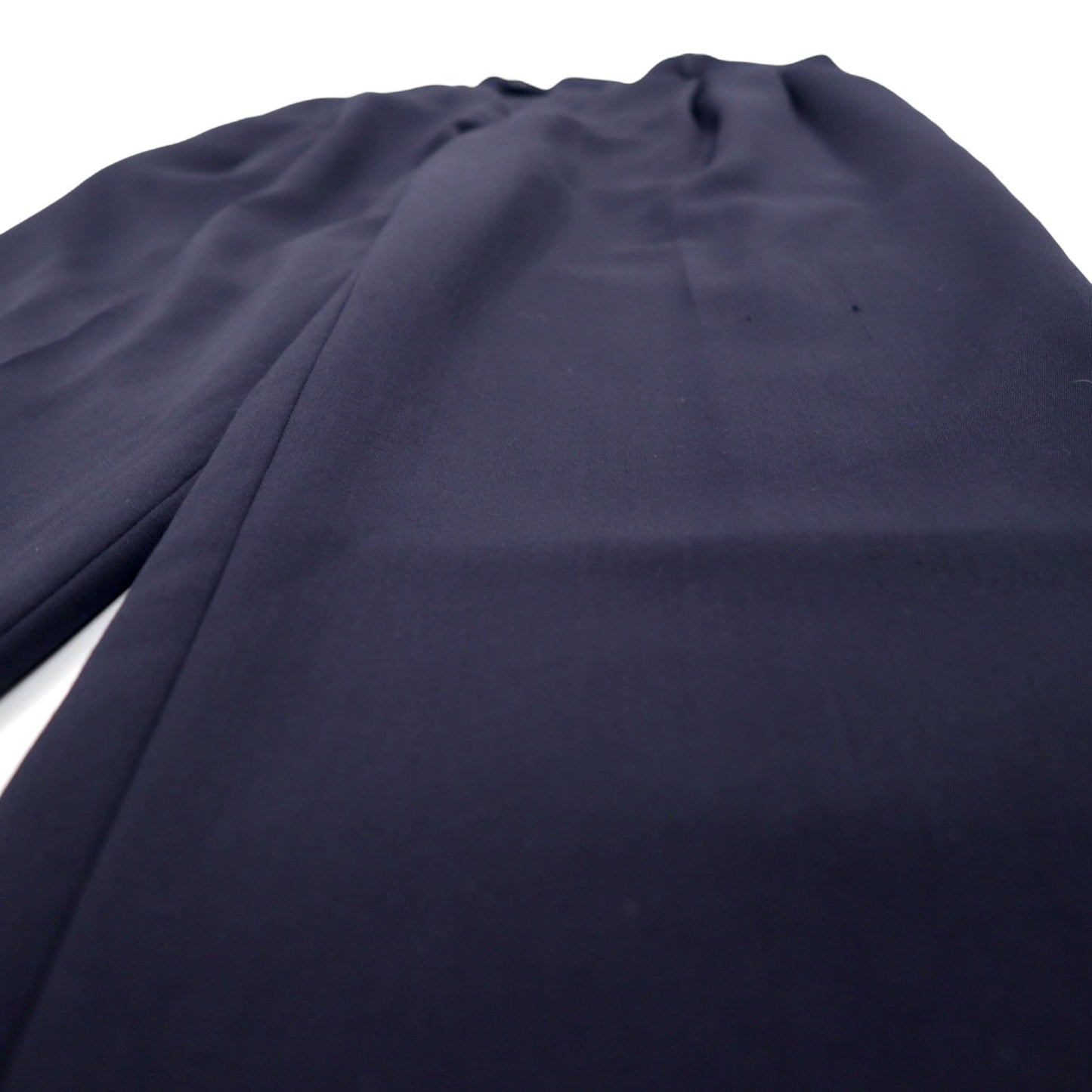 Made in the USA in the 1990s, GOLDEN FIL wide-leg tucked slacks, size 35, navy wool.
