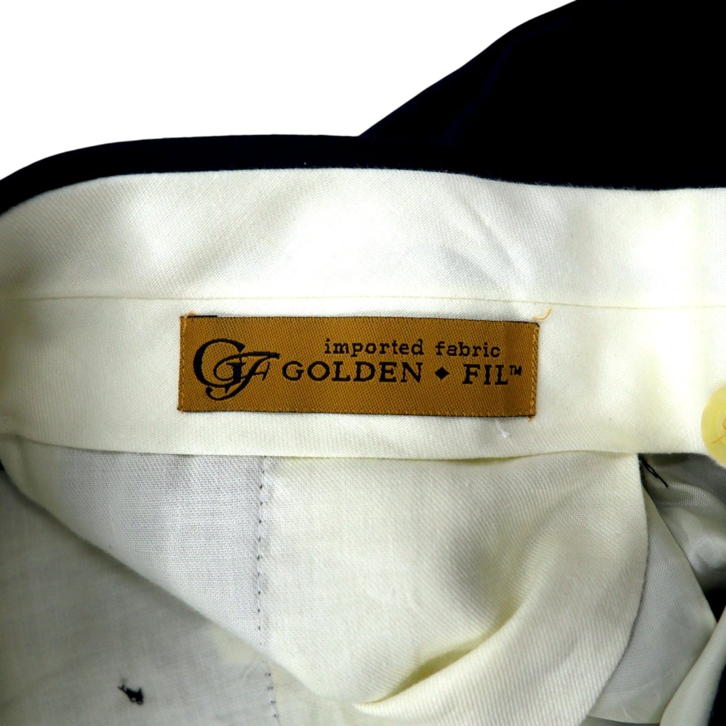 Made in the USA in the 1990s, GOLDEN FIL wide-leg tucked slacks, size 35, navy wool.
