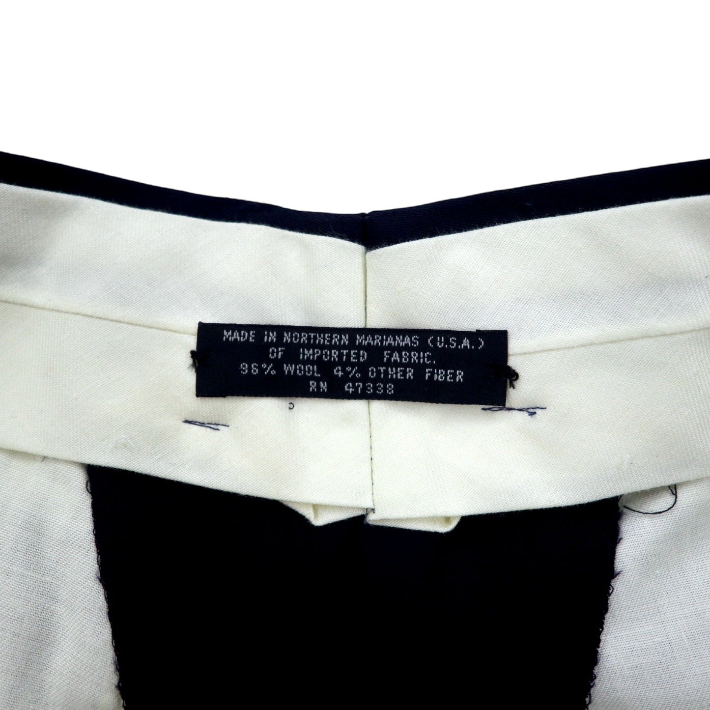 Made in the USA in the 1990s, GOLDEN FIL wide-leg tucked slacks, size 35, navy wool.
