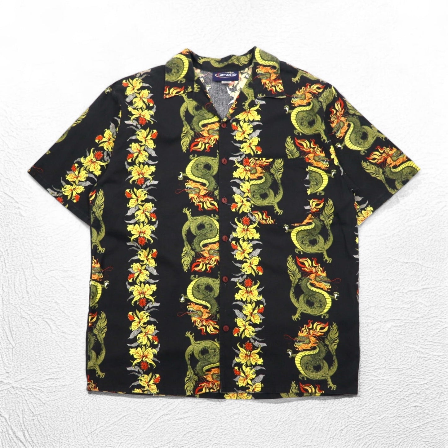 Made in the USA, 90s LATITUDE 32 open-collar aloha shirt, size 3XL, black, all-over dragon and hibiscus print.