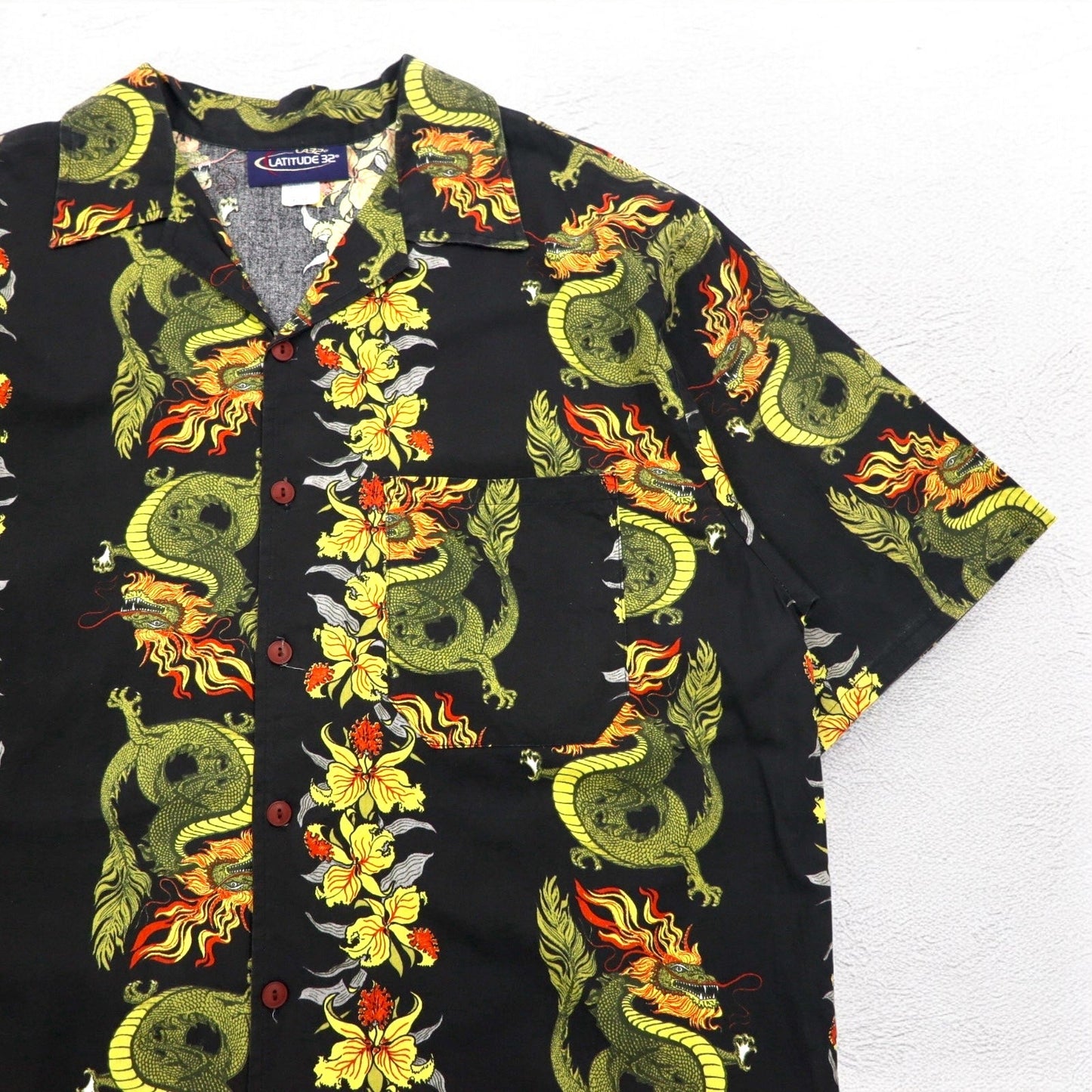 Made in the USA, 90s LATITUDE 32 open-collar aloha shirt, size 3XL, black, all-over dragon and hibiscus print.