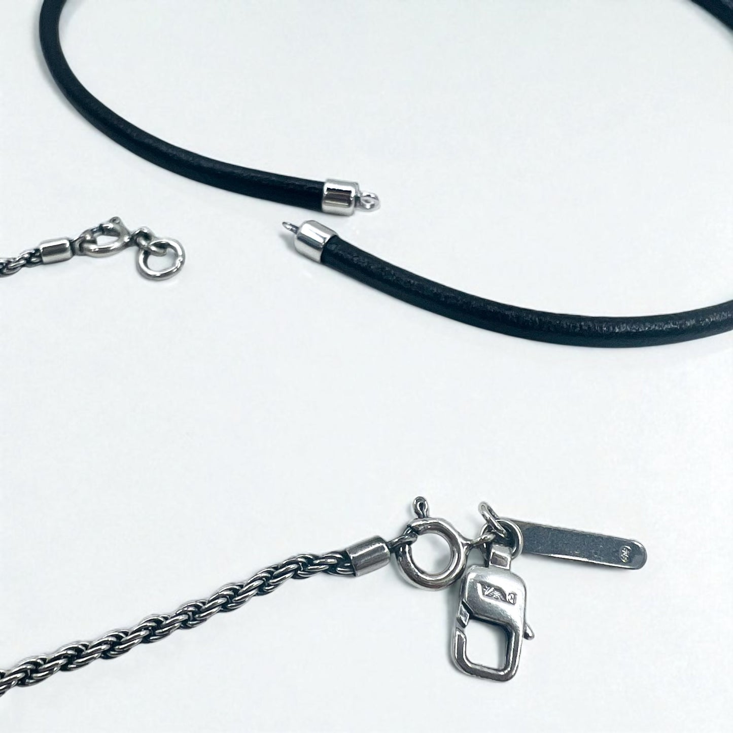 EMPORIO ARMANI 2-Way Cross Necklace in Silver 925 and Leather
