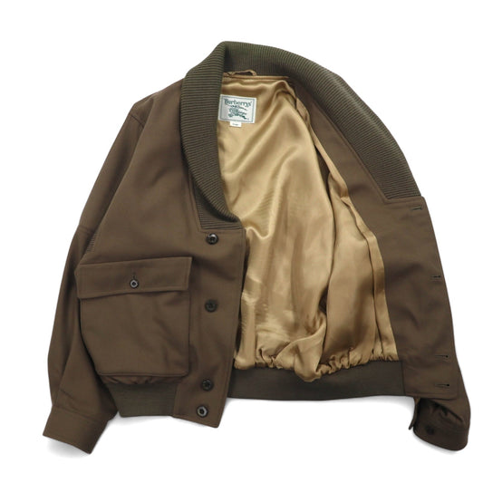 Burberry's shawl collar A-1 military jacket, size L, brown, ribbed wool knit with embroidered logo.