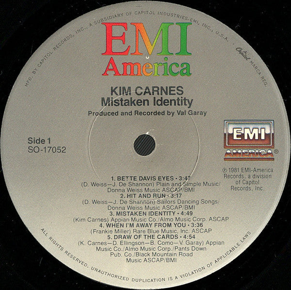 Kim Carnes - Mistaken Identity (Vinyl, LP, Album, Stereo) Very Good Plus (VG+) / Very Good Plus (VG+)