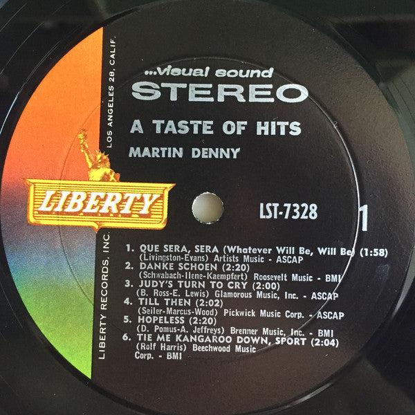 Martin Denny - A Taste Of Hits (Vinyl, LP, Album, Stereo) Very Good (VG) / Good Plus (G+)