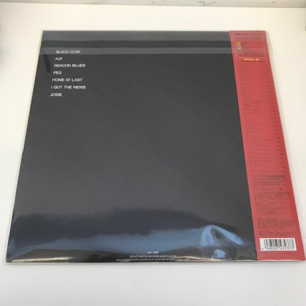 Steely Dan - Aja (Vinyl, LP, Album, Reissue, Stereo) Very Good Plus (VG+) / Near Mint (NM or M-)