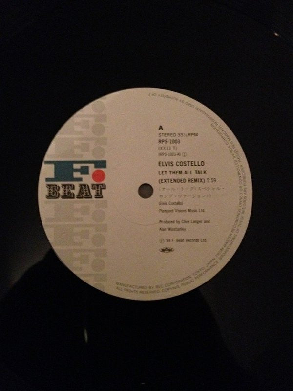Elvis Costello & The Attractions - Let Them All Talk (Vinyl, 12", Single) Very Good Plus (VG+) / Very Good Plus (VG+)