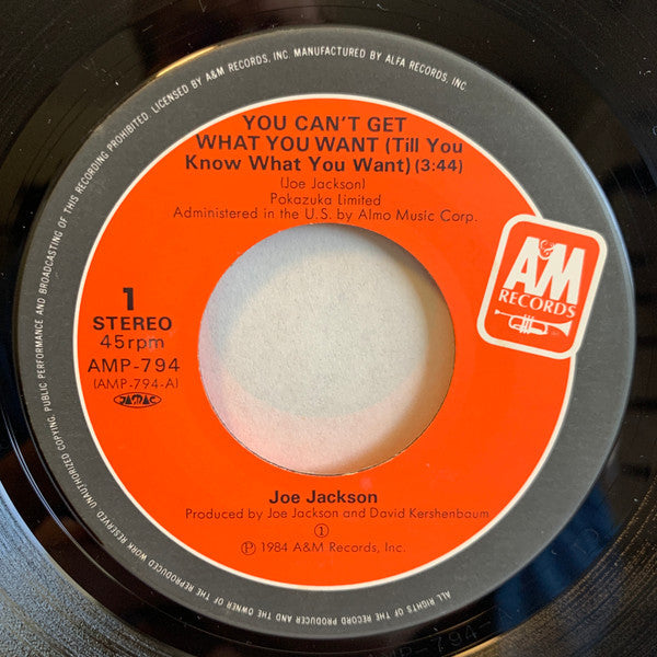 Joe Jackson - You Can't Get What You Want (Till You Know What You Want) (Vinyl, 7", 45 RPM, Single, Stereo) Near Mint (NM or M-) / Very Good Plus (VG+)