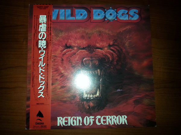 Wild Dogs - Reign Of Terror (Vinyl, LP, Album, Promo) Near Mint (NM or M-) / Very Good Plus (VG+)
