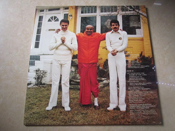 Carlos Santana - Love Devotion Surrender (Vinyl, LP, Album, Reissue) Very Good Plus (VG+) / Very Good (VG)