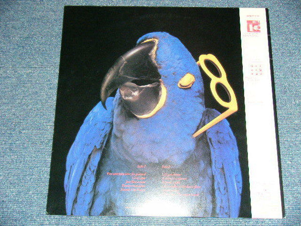 Graham Parker - The Real Macaw (Vinyl, LP, Album) Very Good Plus (VG+) / Very Good Plus (VG+)