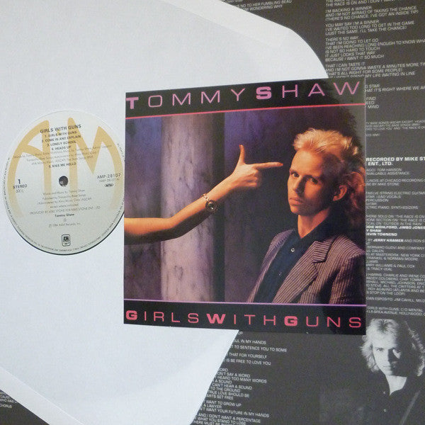 Tommy Shaw - Girls With Guns (Vinyl, LP, Album) Near Mint (NM or M-) / Very Good Plus (VG+)
