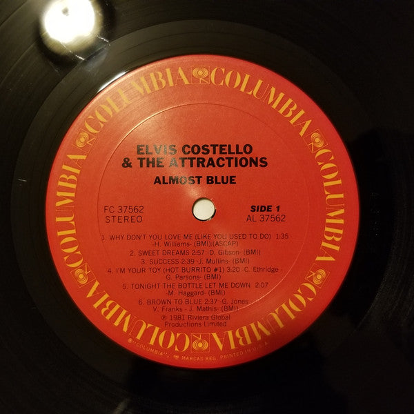 Elvis Costello & The Attractions - Almost Blue (Vinyl, LP, Album, Reissue, Stereo) Very Good (VG) / Good Plus (G+)