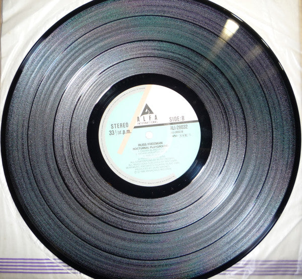 Russ Freeman (2) - Nocturnal Playground (Vinyl, LP, Album, Promo, Stereo) Near Mint (NM or M-) / Very Good Plus (VG+)