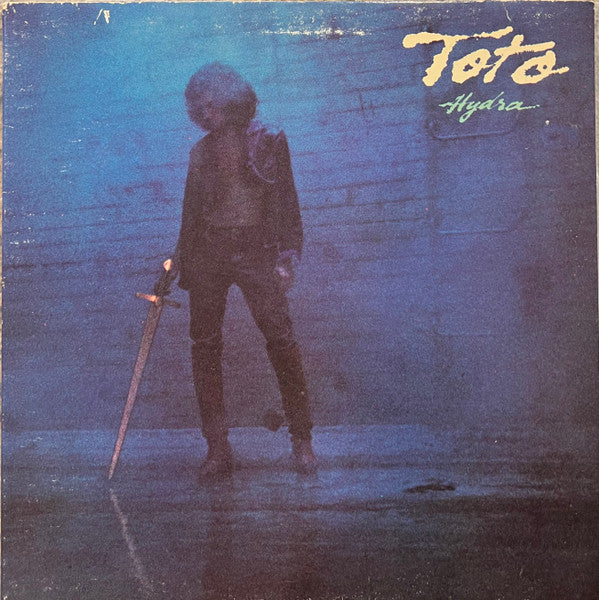 Toto - Hydra (Vinyl, LP, Album, Reissue) Good Plus (G+) / Very Good Plus (VG+)
