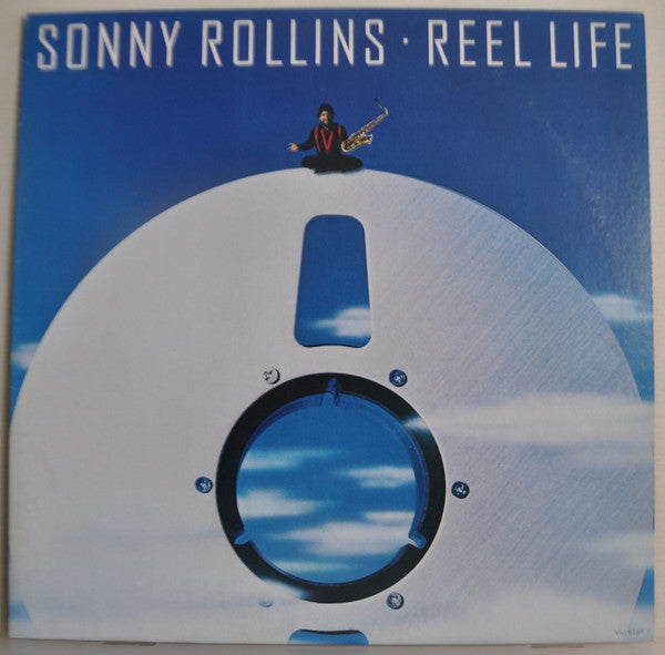 Sonny Rollins - Reel Life (Vinyl, LP, Album) Very Good Plus (VG+) / Very Good Plus (VG+)