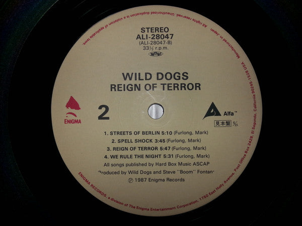 Wild Dogs - Reign Of Terror (Vinyl, LP, Album, Promo) Near Mint (NM or M-) / Very Good Plus (VG+)