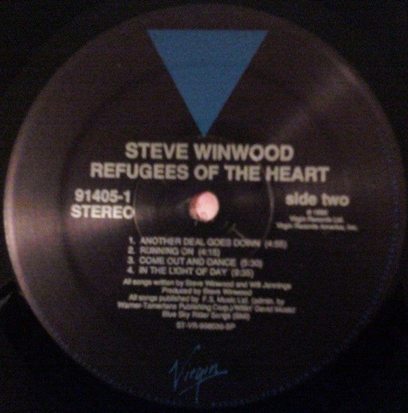 Steve Winwood - Refugees Of The Heart (Vinyl, LP, Album) Very Good Plus (VG+) / Very Good Plus (VG+)