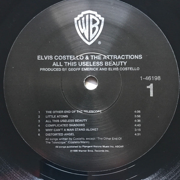 Elvis Costello & The Attractions - All This Useless Beauty (Vinyl, LP, Album) Very Good (VG) / Very Good Plus (VG+)