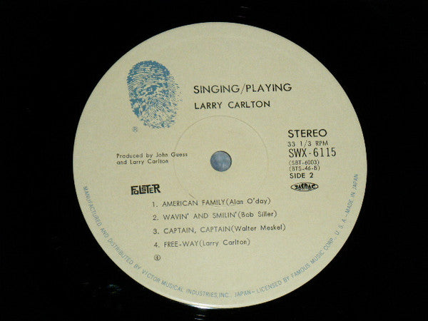 Larry Carlton - Singing / Playing (Vinyl, LP, Album) Very Good Plus (VG+) / Very Good (VG)
