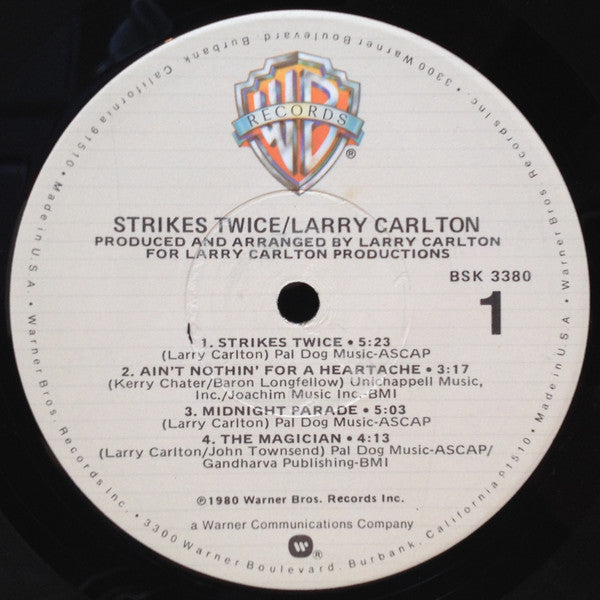 Larry Carlton - Strikes Twice (Vinyl, LP, Album) Very Good (VG) / Very Good (VG)