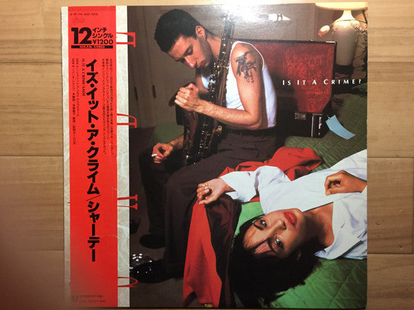 Sade - Is It A Crime? (Vinyl, 12", 45 RPM, Single) Near Mint (NM or M-) / Very Good Plus (VG+)