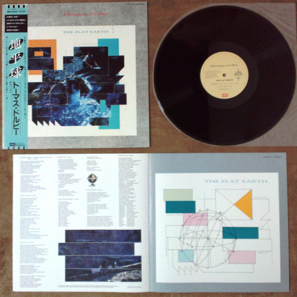 Thomas Dolby - The Flat Earth (Vinyl, LP, Album) Very Good Plus (VG+) / Very Good Plus (VG+)