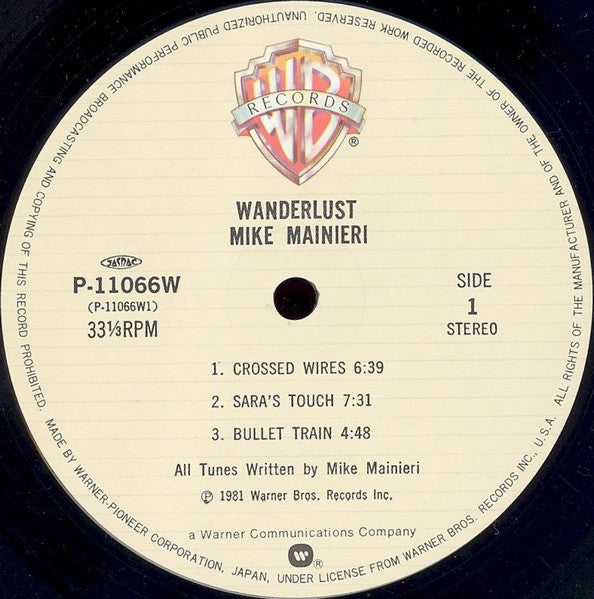 Mike Mainieri - Wanderlust (Vinyl, LP, Album) Near Mint (NM or M-) / Very Good Plus (VG+)