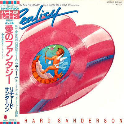 Richard Sanderson - 愛のファンタジー = Reality (Bande Originale Du Film "La Boum") (Vinyl, 10", 45 RPM, Shape, Single) Very Good Plus (VG+) / Very Good (VG)