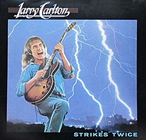 Larry Carlton - Strikes Twice (Vinyl, LP, Album) Very Good Plus (VG+) / Very Good Plus (VG+)