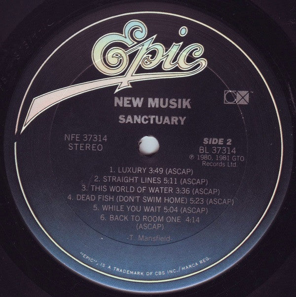 New Musik - Sanctuary (Vinyl, LP, Compilation, Stereo) Very Good (VG) / Very Good Plus (VG+)