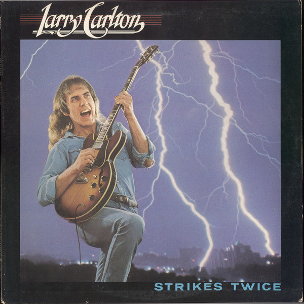 Larry Carlton - Strikes Twice (Vinyl, LP, Album, Misprint) Very Good Plus (VG+) / Very Good Plus (VG+)