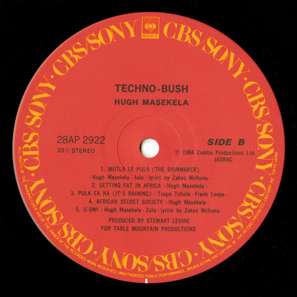 Hugh Masekela - Techno-Bush (Vinyl, LP, Album) Near Mint (NM or M-) / Very Good Plus (VG+)