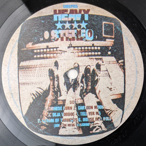 Heavy Stereo - Déjà Voodoo (Vinyl, LP, Album) Near Mint (NM or M-) / Near Mint (NM or M-)