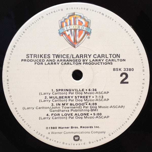 Larry Carlton - Strikes Twice (Vinyl, LP, Album) Very Good (VG) / Very Good (VG)